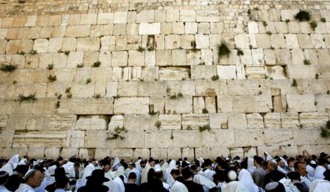 26 Apr 2005, JERUSALEM, Israel --- Ultra-Orthodox Jewish men pray during Passover prayers at the Western Wall in Jerusalem's Old City April 26, 2005.  --- Image by © OLEG POPOV/Reuters/Corbis